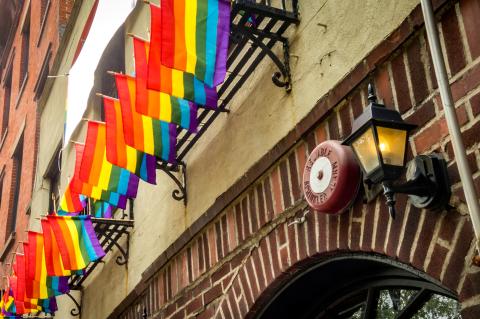 Gay pride flags are hanging outside the The Stonewall Inn in NYC